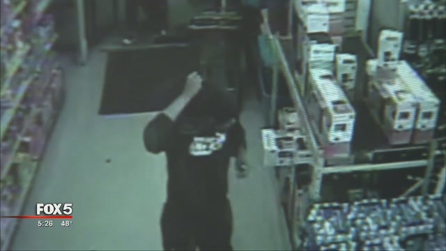 Robber hides in women's bathroom, ambushes store employees
