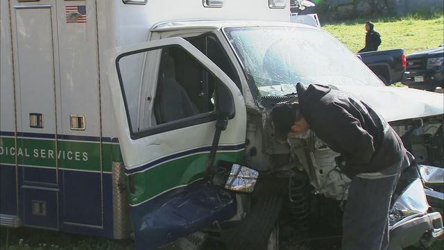 Ambulance chased by troopers smashes into SUV, power pole