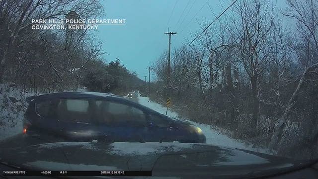 Dashcam video captures car sliding into Kentucky police cruiser