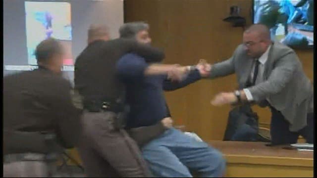 Distraught father tries to attack Nassar in court