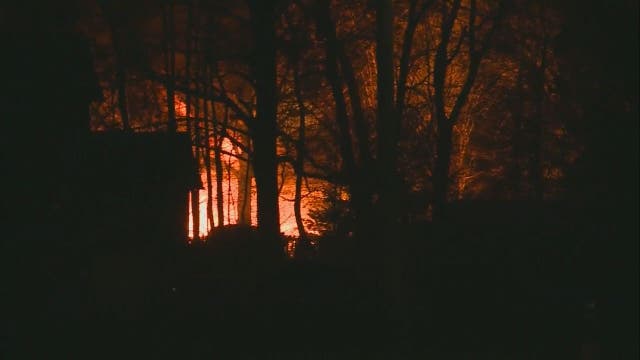 Reports: Explosion causes fire at home where man held wife hostage