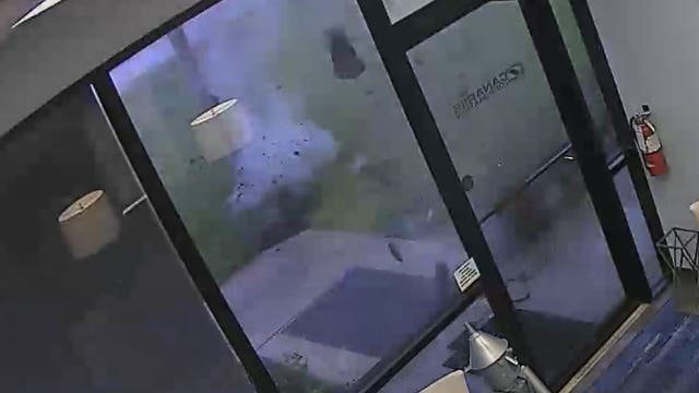 Lightning takes out part of sidewalk outside Florida business