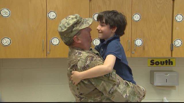 US Navy Reserve commander surprises son at Arlington school after yearlong Afghanistan deployment