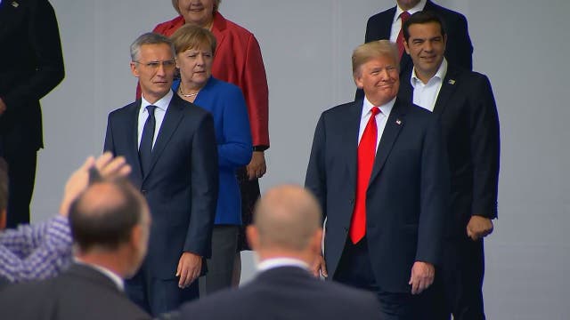 Trump rattles NATO, questioning its value, assailing Germany
