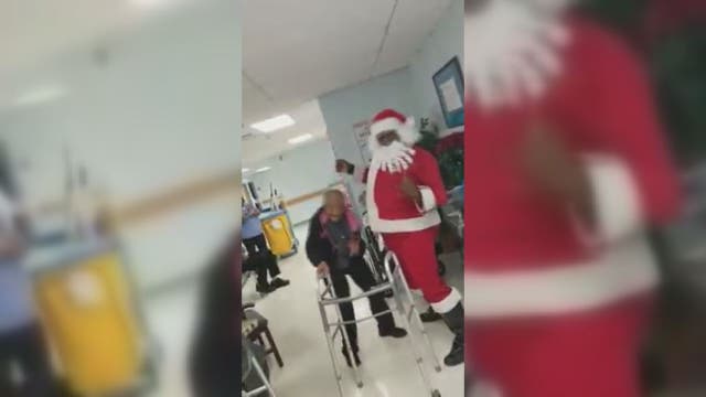 Dance-off between Santa and 90-year-old woman goes viral
