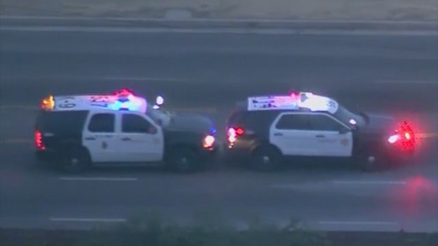 Suspect in stolen sheriff's patrol SUV surrenders after chase, shooting