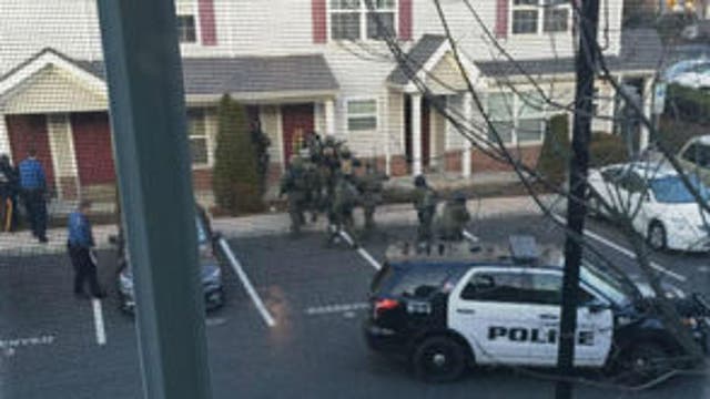 SWAT Team enters Scotch Plains townhouse after reports of robbery at TD Bank