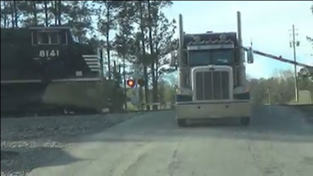 VIDEO: Train smashes into stuck tractor-trailer in Temple
