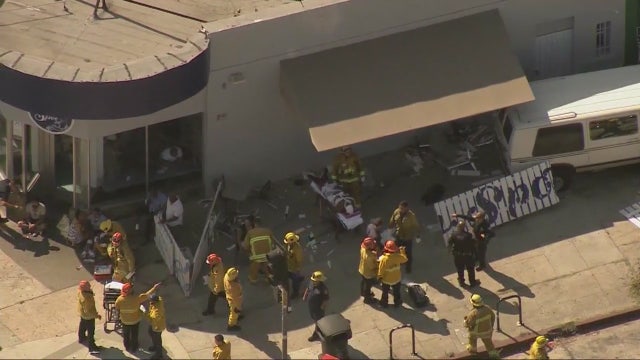 9 injured when van crashes into crowd of people in Mid-Wilshire district