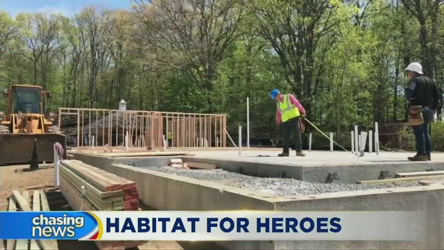 Volunteers build house for Marine veteran