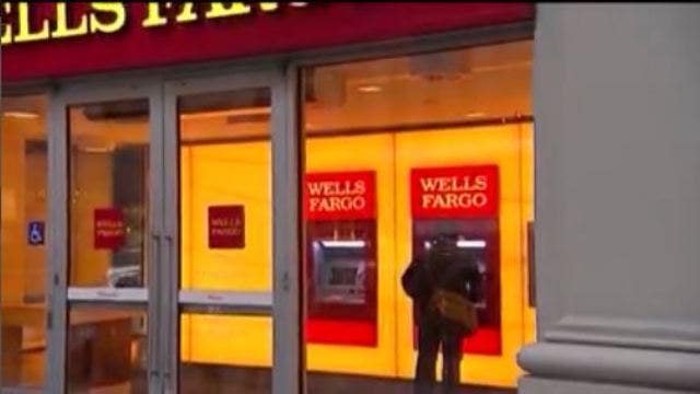 Wells Fargo to pay $1B for mortgage, auto lending abuses