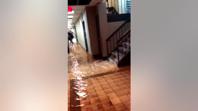 Burst pipe creates waterfall in Minneapolis parking garage