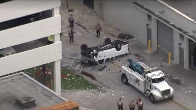 Car falls off Miami International Airport parking garage
