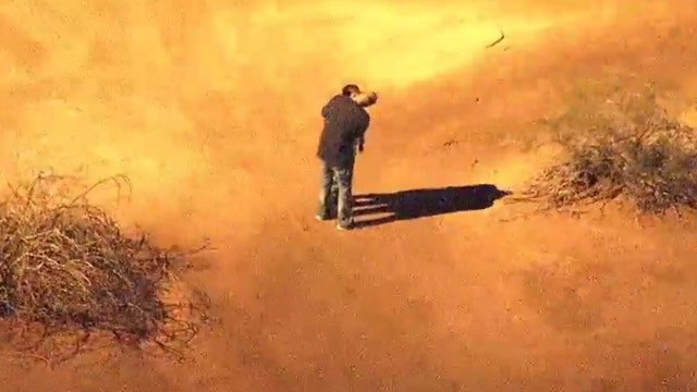 Suspects embrace before police chase in Southeast Valley ends with their arrest