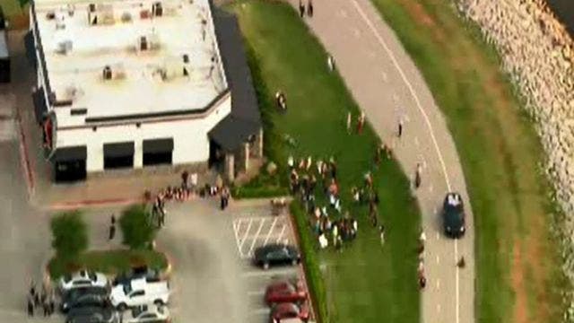 Civilians kill gunman after 3 shot at Oklahoma restaurant