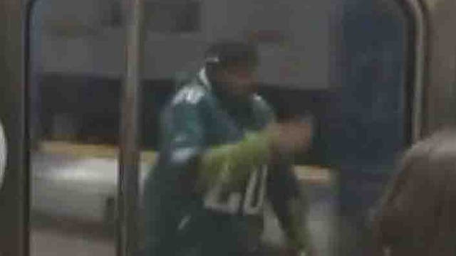 Excited Eagles fan slams into pole chasing after subway train