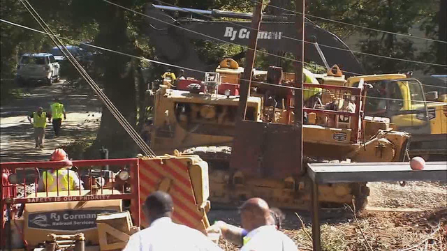 Neighbors recount train derailment, rescue of man