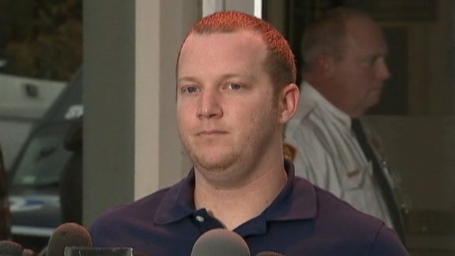 Hero cop who shot suspect: 'just doing' my job