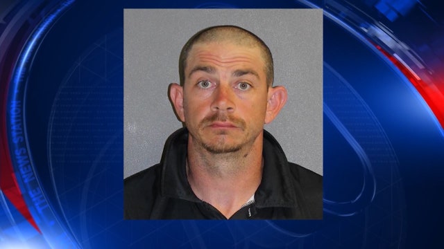 Coach arrested, accused of punching kids