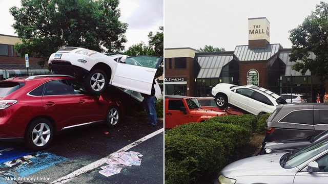 Lexus SUV found on top of another Lexus SUV after parking mishap at Md. shopping center