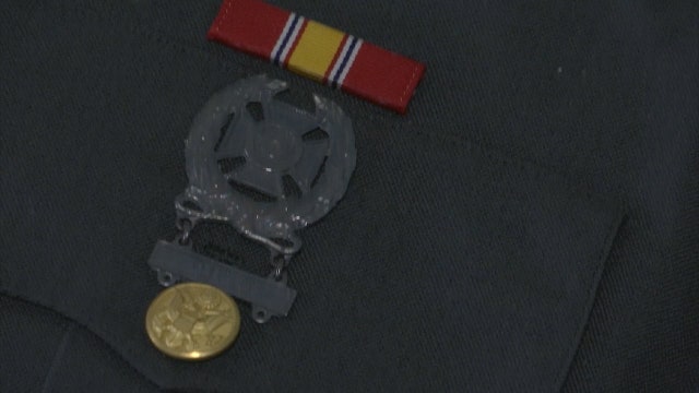 Owner of discarded military uniform, keepsakes sought