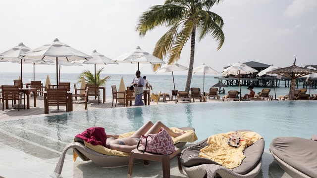 Family looking to pay photographer $100K to document their travels around the world for year