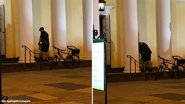 Secret Service officer gives hot meal to homeless man