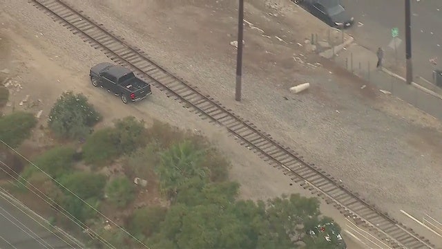 Police pursuit of reported stolen truck ends in standoff