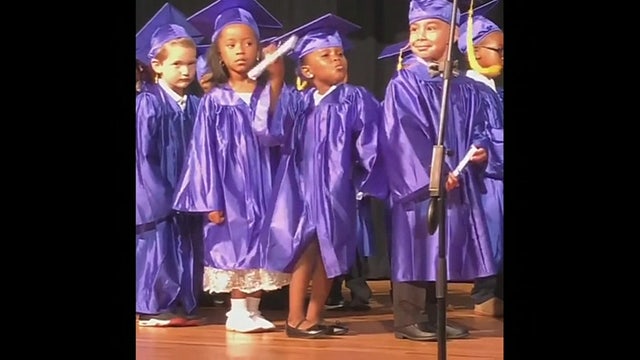 The cutest graduate: 5 year-old steals show at kindergarten graduation