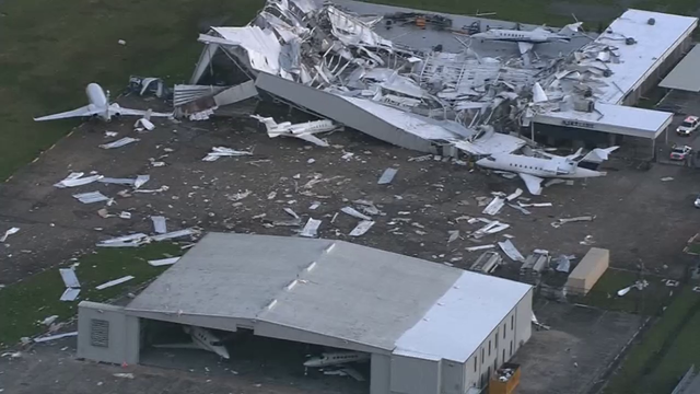 Microburst damages hangar, airplanes at Hobby Airport
