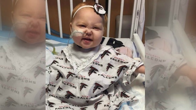 CHOA shares photo of young Falcons fan battling cancer