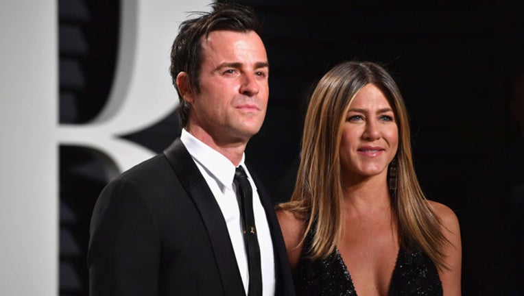 d7075122-aniston_theroux_695550813AP00090_2017_Vanit_1518738362509_getty_images-408795