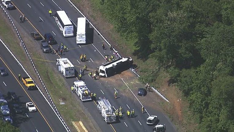 3c7b034a-Charter bus overturns 051517-401720
