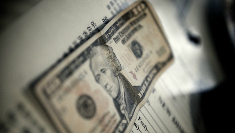 3a3ae045-tip-money-tipping-cash_1499694455092-404023.jpg