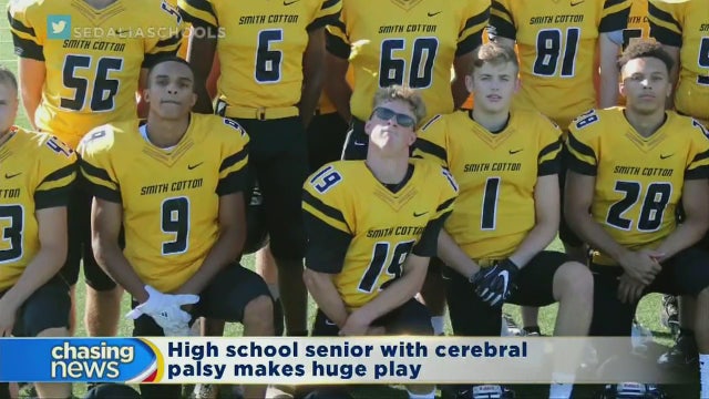 Student with cerebral palsy scores touchdown