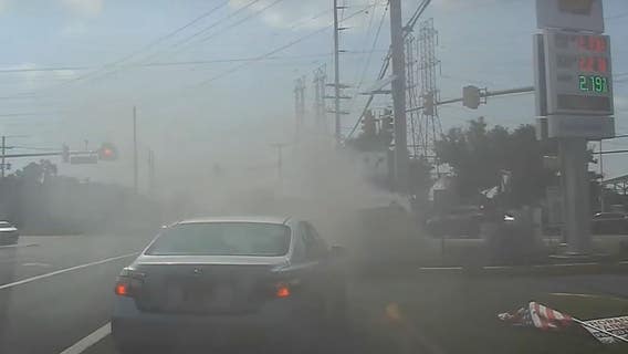 2 men pull unconscious driver from burning vehicle