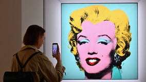 Andy Warhol's Marilyn Monroe portrait sells for record $195 million at auction