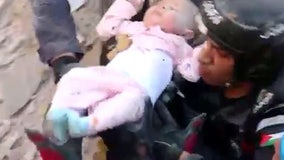 Baby pulled alive from rubble 26 hours after Jordan building collapse