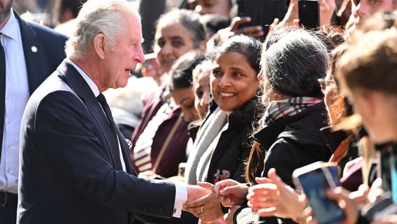 King Charles, Prince William greet mourners lined up to view queen's coffin