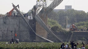 9 arrested after bridge collapse in India kills at least 134