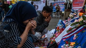 Soccer match stampede: Indonesian police probe tear gas firing after 125 killed