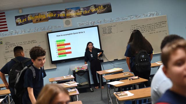 Local school officials clash with parents over campus restrictions on cell phones