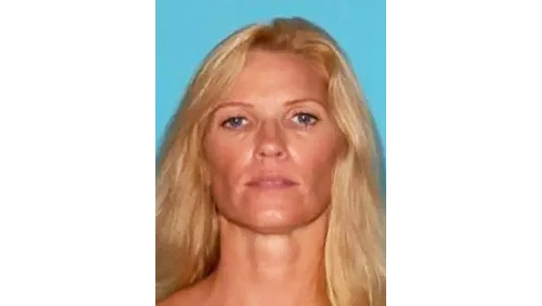 Wife charged in husband's murder