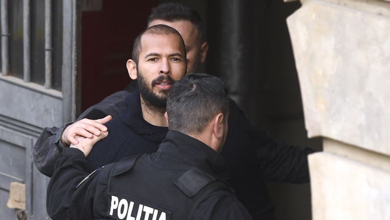 Andrew Tate arrives in court to attend his appeal in Romania