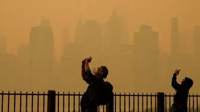 Dangerous air quality smothers major cities as Canada wildfires push smoke into US