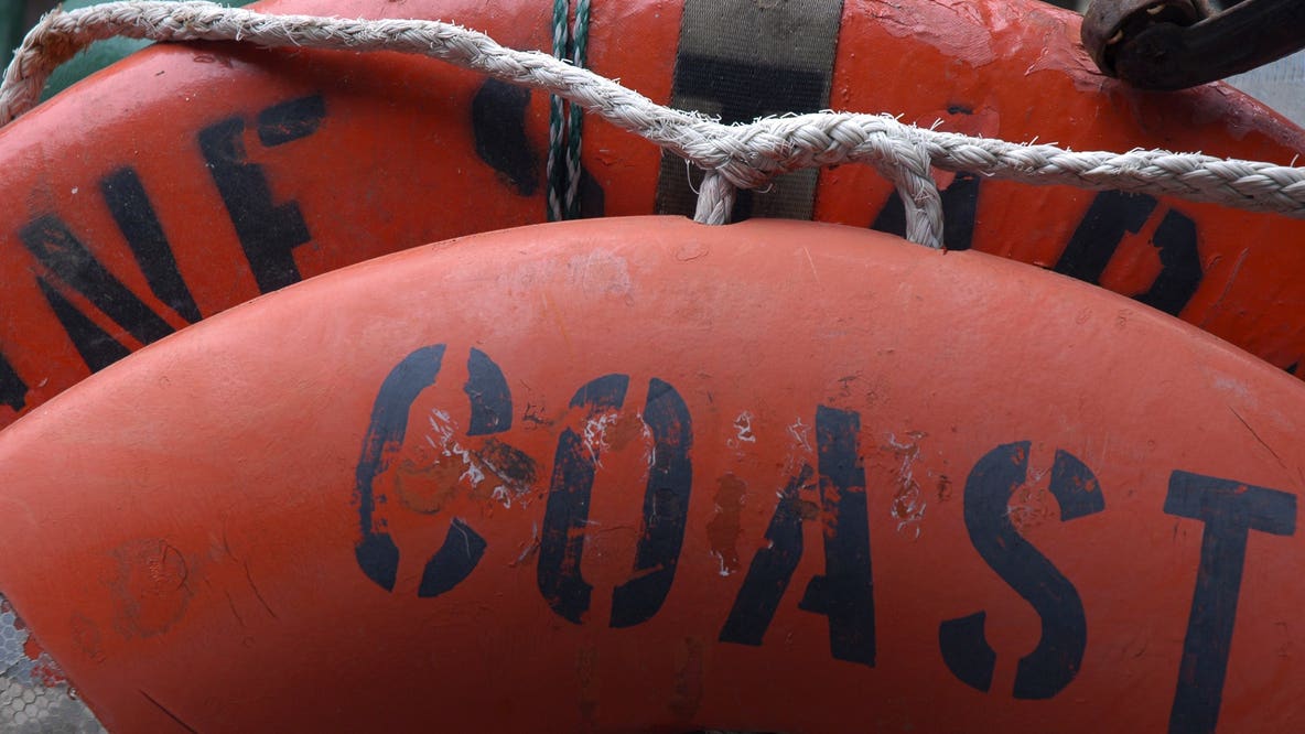 Coast Guard rescues 4 from vessel trapped on ice in Alaska