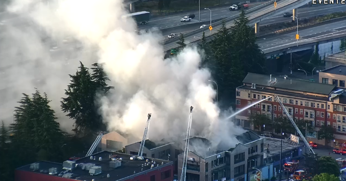 Crews battle two-alarm fire in Seattle's International District | FOX ...