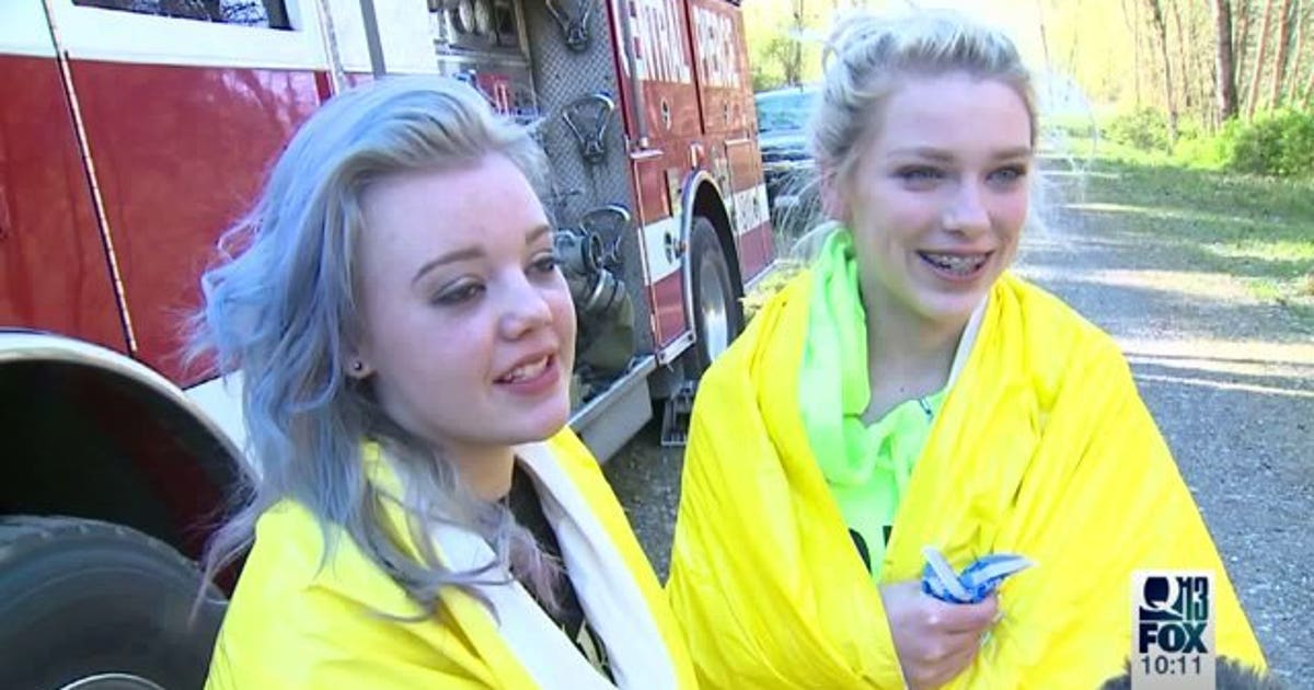 Two 15-year-old girls rescued after being stuck on steep hillside along ...