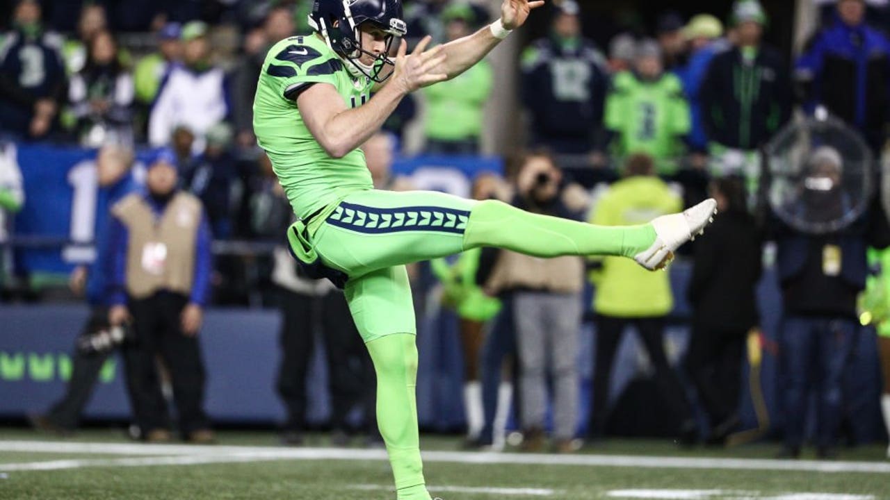 Punter (4) Michael Dickson of the Seattle Seahawks punts the ball