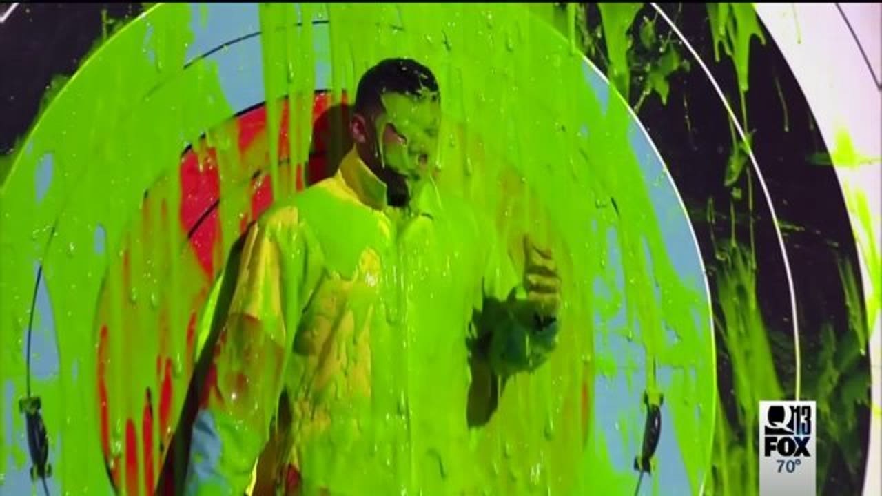 SEE IT Russell Wilson gets 'slimed' on Kids' Choice Sports Awards